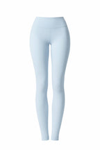 Light blue leggings on a white background
